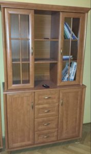 Cabinet with drawers, shelves and glazing.