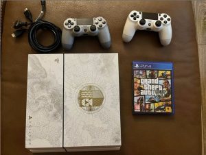 PlayStation 4 limited edition with 2 controllers and game