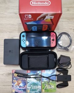 Nintendo Switch OLED + games and case included