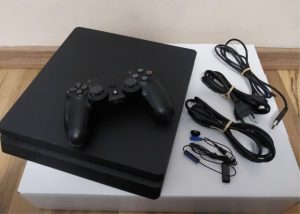 Playstation 4 slim + 2tb disc, all under warranty