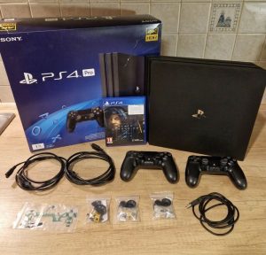 Sony PlayStation 4 Pro 1TB + 2x controller + game