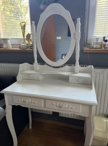 I am selling a cosmetic table with a chair