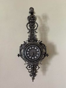 Heavy hanging metal clock