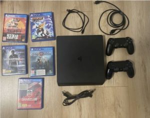 Playstation 4 1TB slim, 2 controllers, games