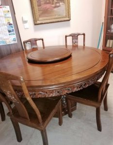 Beautiful, hand-carved teak table with 6 chairs for sale