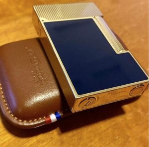 St Dupont gold lighter, gift leather case