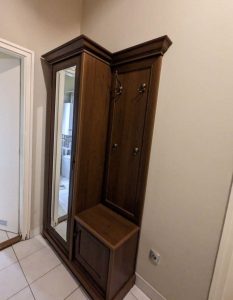 Hall closet with mirror