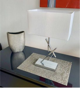 Modern table lamp with chromed metal frame